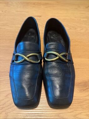 Women’s Black Leather Loafers with Gold Twist Accent